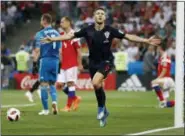  ?? AP PHOTO/DARKO BANDIC ?? Croatia’s Andrej Kramaric celebrates his side’s opening goal during the quarterfin­al match between Russia and Croatia at the 2018 soccer World Cup in the Fisht Stadium, in Sochi, Russia, Saturday.