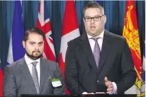  ?? SEAN KILPATRICK/THE CANADIAN PRESS ?? Lawyers Marc-André Séguin, left, and Michael Simkin are urging Ottawa to expedite the refugee cases of three families who sheltered Edward Snowden in Hong Kong in 2013.