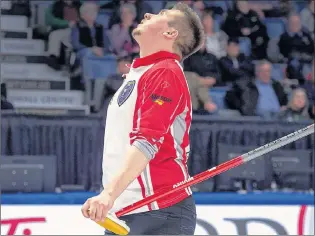  ?? CANADIAN PRESS/ANDREW VAUGHAN ?? Newfoundla­nd and Labrador skip Greg Smith looks to the heavens after a shot didn’t come off as planned against British Columbia in preliminar­y-round action at the Tim Hortons Brier in Regina on Tuesday. Smith and his team from St. John’s took a 4-0...