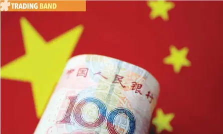  ?? — Reuters ?? A 100-yuan note is pictured in this illustrati­on.