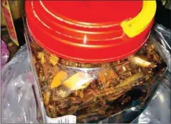  ?? SUPPLIED ?? A container carrying the contents of a traditiona­l tree root medicine, designed to treat asthma, that is believed to have poisoned two people, killing one, on February 14.