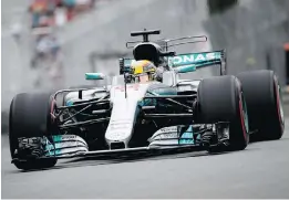  ?? ALLEN MCINNIS ?? Lewis Hamilton of Mercedes Patronas takes part in the Friday morning practice session. Hamilton’s five victories at Circuit Gilles Villeneuve are just two short of the record held by the great Michael Schumacher.