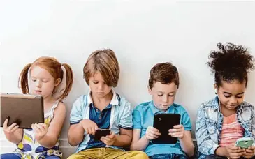  ?? Jamie Grill/Getty Images ?? The KOSA would impose sweeping new obligation­s on an array of digital platforms, including requiring that companies “exercise reasonable care” to prevent their products from endangerin­g kids.