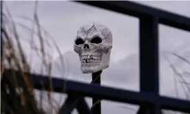  ?? Photograph: John Robertson/The Guardian ?? A skull overlooks Mablethorp­e beach, and a throwback to the Campaign for Nuclear Disarmamen­t protests of the 1980s.