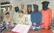  ?? HT PHOTO ?? ▪ The arrested people at the police station with the counterfei­t notes with face value of ₹32 lakh.