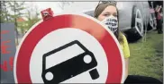  ?? Picture: GETTY IMAGES ?? FOR CLEAN AIR: Activists protest in front of Germany’s federal transport ministry in Berlin yesterday ahead of a conference on diesel