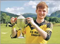  ?? 06_a32shintyb­ullough08 ?? A delighted Inveraray captain, Allan Cameron, holds the Bullough Cup.