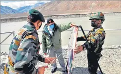  ??  ?? Prime Minister Narendra Modi being briefed in Leh on Friday.