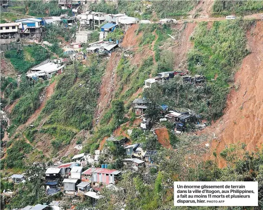  ?? PHOTO AFP ?? Un énorme glissement de terrain dans la ville d’Itogon, aux Philippine­s, a fait au moins 11 morts et plusieurs disparus, hier.