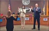  ?? City of Huntington Beach ?? TITO ORTIZ, an anti-mask proponent, is shown swearing in as mayor pro tem of Huntington Beach.