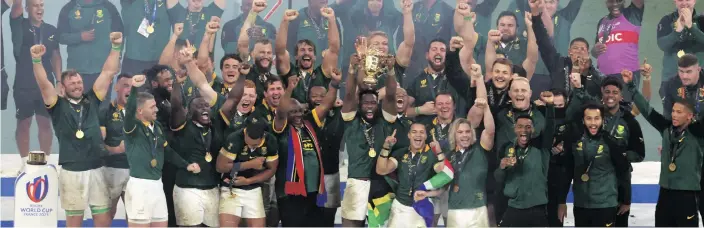  ?? Above: Siya Kolisi lifts the trophy with his teammates after the Rugby World Cup final against New Zealand at the Stade de France on 28 October 2023 in Paris, France. Below: Director of rugby Rassie Erasmus is contracted until 2025 and will oversee a mass ??