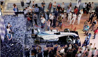  ?? Photo by Ryan Lim ?? Felipe Massa and Lance Stroll grace the unveiling of the Williams Racing F1 car at the Mushrif Mall in Abu Dhabi. —