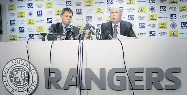  ?? ?? David Whitehouse and Paul Clark during a press conference at Ibrox Stadium in 2012