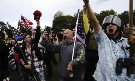  ?? Photograph: John Locher/AP ?? Members of the Proud Boys and other rightwing demonstrat­ors rally on Saturday in Portland.