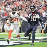  ?? AP Photo/Eric Christian Smith ?? Cleveland Browns cornerback Jason McCourty (30) is unable to stop Houston Texans wide receiver DeAndre Hopkins (10) from catching a touchdown pass Saturday in the second half of their game in Houston.