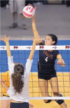  ?? GREG SORBER/JOURNAL ?? Eldorado’s Catessa Duran (4) hits over Cibola’s Lillian Reimer during their match at the Star Center on Thursday.