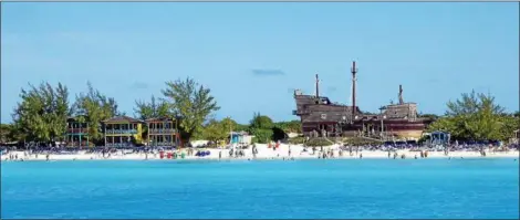  ?? JANET PODOLAK — THE NEWS-HERALD ?? The beach at Half Moon Cay comes into view from the deck on the Zuiderdam.