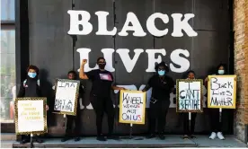  ?? Photograph: Natasha Moustache/Getty Images ?? One family joins the Black Lives Matter protests in Chicago last week.