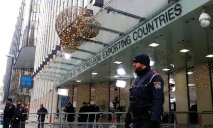  ??  ?? A guard outside Opec’s headquarte­rs in Vienna on Thursday. Photograph: Leonhard Föger/Reuters