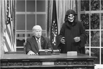  ??  ?? Alec Bald��in as President Donald J. Trump, Mi��e�� Da�� as advisor Steve Bannon during the Oval Office Cold Open on ‘Saturda�� Night Live’ on Feb. 4.