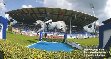  ??  ?? Molly Malone V and Bertram Allen tackle the water in Aachen