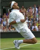  ?? Photograph: Tom Jenkins/ The Guardian ?? The ponytailed 19-year-old Federer reacts to beating Pete Sampras at Wimbledon in 2001.