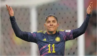  ?? AP PHOTO/ HAMISH BLAIR ?? Colombia’s Catalina Usme celebrates during her team’s match against Jamaica in the round of 16 at the Women’s World Cup on Tuesday in Melbourne, Australia.