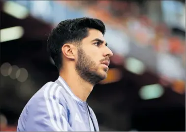  ?? ?? Asensio salta al campo durante un partido de esta temporada con el Real Madrid.