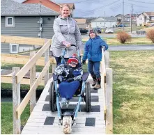  ?? ROSIE MULLALEY • THE TELEGRAM ?? Adina Stamp of Bay Bulls loves to get outside with her fiveyear-old sons, Lyndon and Zander. She said the new wheelchair for Lyndon allows them to explore off-road hiking trails and areas of the province.
