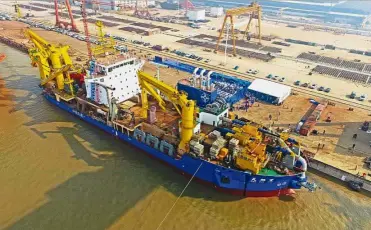  ?? — AFP ?? Larger than life: ‘ Tian Kun Hao’ being launched at a port in Qidong in Jiangsu province.