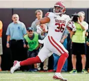  ?? [PHOTO BY NATE BILLINGS, THE OKLAHOMAN] ?? Oklahoma’s Dimitri Flowers has scored in three consecutiv­e games, drawing an increasing amount of attention from opposing defenses.