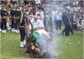  ?? — PTI ?? Family members of Naib Dipak Singh perform his last rites at Farenda in Rewa district on Friday.