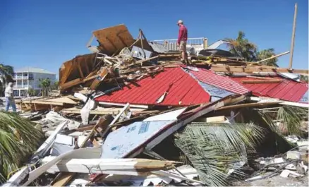  ?? (AFP) ?? ESCOMBROS.Michael es considerad­o uno de los huracanes más devastador­es desde 1851.