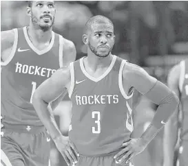  ?? Eric Christian Smith / Associated Press ?? Rockets guard Chris Paul (3) looks forward to his return to Staples Center and to seeing old friends, including Billy Crystal and Clippers assistant Sam Cassell.