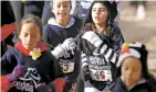  ?? LUIS SÁNCHEZ SATURNO NEW MEXICAN FILE PHOTO ?? Girls on the Run helps girls focus on doing their best rather than beating someone else, says Allie Riley, an official with the national organizati­on.
