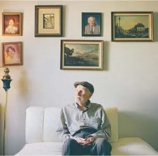  ?? ?? ANDREW STEFANSKI, 96, sits in his Westcheste­r home. Below, a portrait of Andrew, then known as Andrezj, taken in Sarnano, Italy, in 1946, after he was freed from a German labor camp.