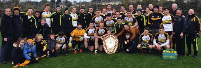  ??  ?? Dr Crokes captain Johnny Buckley and his team after victory of Austin Stacks in the Killarney Credit Union County League Final in Killarney on Saturday. Photo by Don MacMonagle