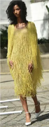  ?? GETTY IMAgES ?? RODARTE: Bright yellow fringe can lift any mood.