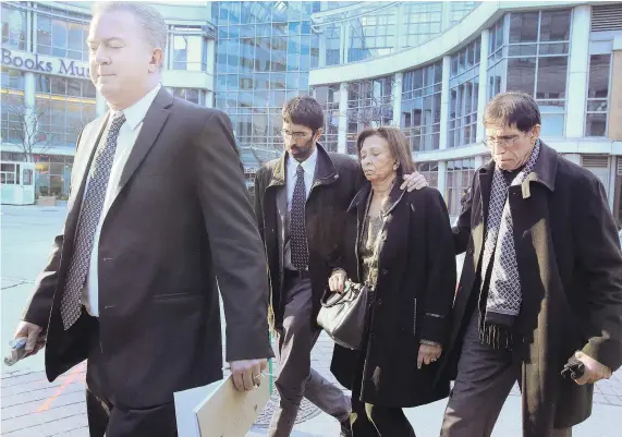  ?? — POSTMEDIA NEWS FILES ?? Lawyer Liam O’Connor, left, and relatives of the accused leave Old City Hall on Friday, after the first court appearance for Mohammed Shamji, 40, a Toronto neurosurge­on.