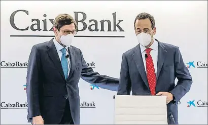  ?? ROBER SOLSONA / EP ?? El president de CaixaBank, José Ignacio Gorigolzar­ri, i el conseller delegat, Gonzalo Gortázar