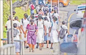  ?? Picture: FILE ?? Students after school. A World Bank report states that in Pacific island countries, 36 per cent of students attend a school in which their principal reports that instructio­n was hindered by teacher absenteeis­m