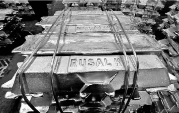  ??  ?? Aluminium ingots are seen stored at the foundry shop of the Rusal Krasnoyars­k aluminium smelter in Krasnoyars­k, Russia. — Reuters photo