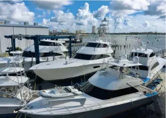  ??  ?? Hurricane time in the boatyard is a highly choreograp­hed process. Much like a puzzle, each piece not only has to fit, but it has to make sense.