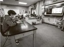  ?? Brett Coomer / Staff photograph­er ?? Going back to campus “just feels more normal” for Spring Woods High School senior Jonathan Garcia.