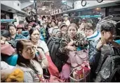  ?? YE AUNG THU/GETTY-AFP ?? The faithful pack buses to a Catholic church Saturday in Yangon, Myanmar, ahead of the pope’s arrival Monday.