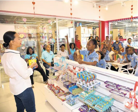  ?? FILE ?? Spelling Bee winners tour Fontana Pharmacy, Waterloo Square, as part of their reward.