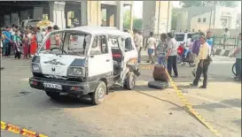  ?? HT PHOTO ?? The school van that was hit by a speeding tanker near Kanhaiya Nagar Metro station.