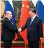  ?? ?? Russian PM Mikhail Mishustin with President Xi Jinping.