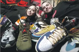  ?? Gary Coronado Los Angeles Times ?? MANUEL CRUZ sold most of his sneaker collection for $24,000 at CoolKicks to pay for his wedding to wife Vivian, left, fund a honeymoon in Hawaii and build a down payment for a house.