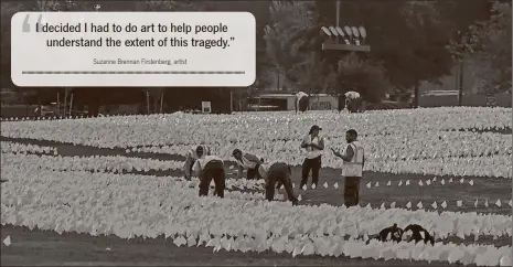  ?? Anna Moneymaker/getty Images/tns ?? Landscape workers place white flags on the National Mall for Suzanne Brennan Firstenber­g’s art installati­on “In America: Remember” on Sept. 15 in Washington, D.C. A total of 650,000 white flags will cover the National Mall to represent each person who has died of COVID-19 in the United States.